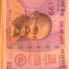 100 rs note with DOB 06/11/99