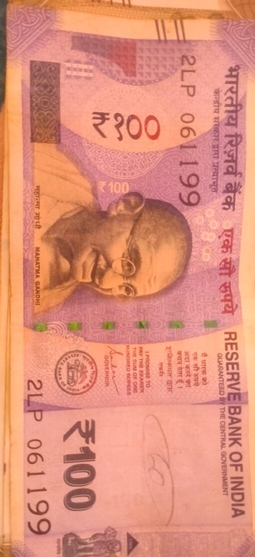 100 rs note with DOB 06/11/99