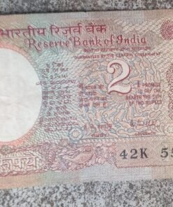 Two rupee note with Angel number