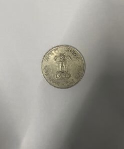 One rupee coin.