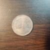 Coins and note